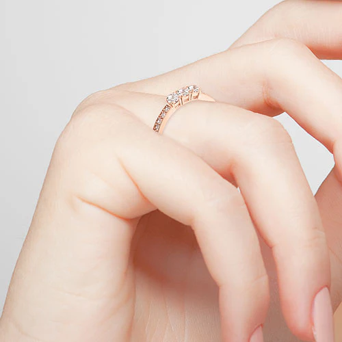 14K Rose Gold over Sterling Brilliant White Topaz Three Stone Engraved Wedding Ring - Image 3